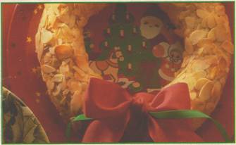 Zoete kerstkrans met notenspijs